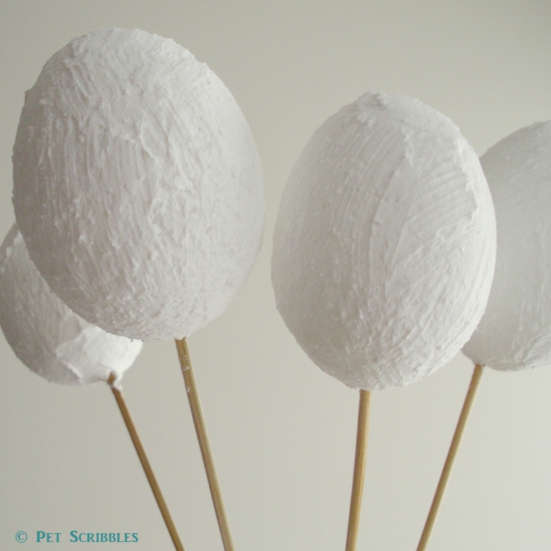 Styrofoam eggs covered with a purposely thick and rough texture of Smooth Finish Paintable Coating.