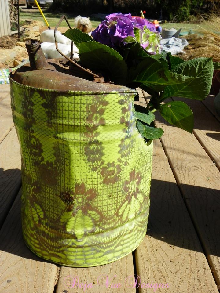 Vintage gas can turned into flower planter by Deja Vue Designs