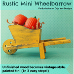 Rustic Mini Wheelbarrow with a painted tin faux finish